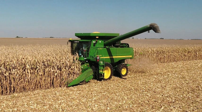 A corn harvester running on the rows with the HG100 automatic row guidance